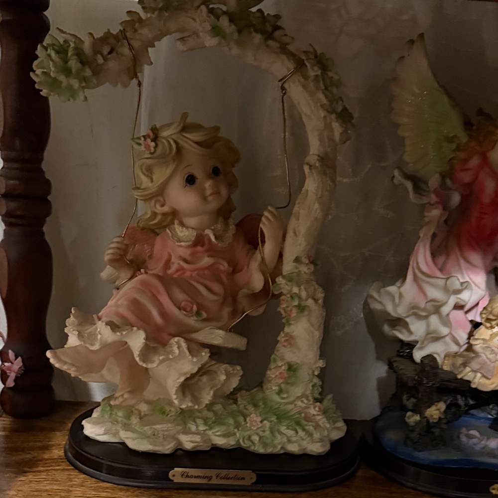 Adorable Girl on Swing Figurine